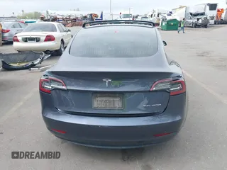2020 Tesla Model 3 Long Range with VIN 5YJ3E1EB1LF639055, listed as a IAAI auction lot 42048009 with 43,493 mi miles. Bid and sale history available at carsss.com. Image 16.