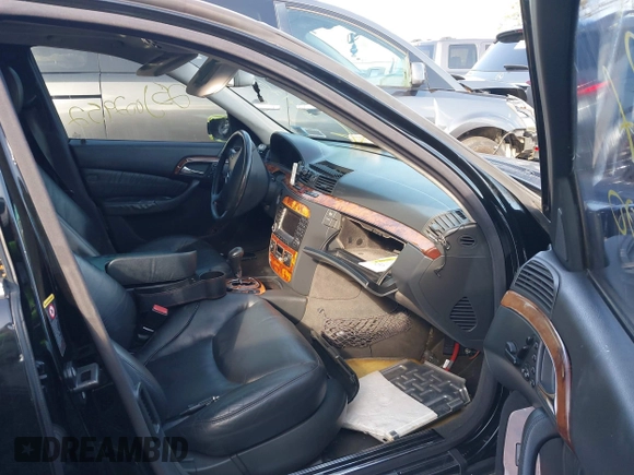 2004 Mercedes-Benz S-Class 5.0L with VIN WDBNG84J44A427425, listed as a IAAI auction lot 41851176 with 999,999 mi miles. Bid and sale history available at carsss.com. Image 5.