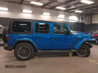 2021 Jeep Wrangler Unlimited Sport S with VIN 1C4HJXDN5MW717673, listed as a IAAI auction lot 42210527 with 35,635 mi miles and . Bid and sale history available at DreamBid. Image 13.