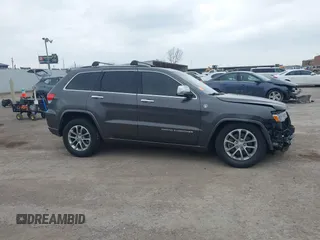 2015 Jeep Grand Cherokee Overland with VIN 1C4RJFCT3FC131122, listed as a IAAI auction lot 41513892 with 125,765 mi miles. Bid and sale history available at carsss.com. Image 13.