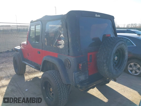 1997 Jeep Wrangler SE z VIN 1J4FY29PXVP476036, wystawiony jako IAAI lot #41882559 z przebiegiem 82 888 mil mil oraz . Historia ofert i sprzedaży dostępna na DreamBid. Obrazek 3.