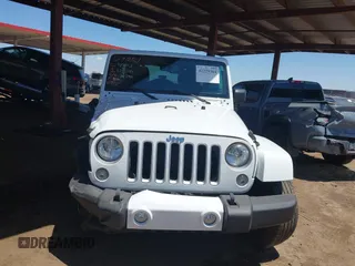 2016 Jeep Wrangler Unlimited Sahara with VIN 1C4BJWEG0GL126270, listed as a IAAI auction lot 42229364 with 50,847 mi miles and . Bid and sale history available at DreamBid. Image 6.