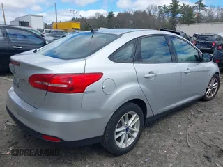 2017 Ford Focus SE with VIN 1FADP3F25HL335102, listed as a IAAI auction lot 42010697 with 77,389 mi miles. Bid and sale history available at carsss.com. Image 4.