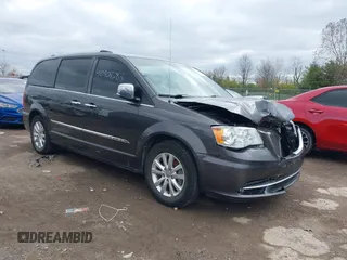 2016 Chrysler Town & Country Limited Platinum with VIN 2C4RC1GG8GR120023, listed as a IAAI auction lot 40808283 with 162,560 mi miles. Bid and sale history available at carsss.com. Image 1.