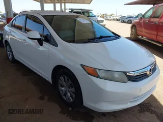2012 Honda Civic LX z VIN 2HGFB2F5XCH609682, wystawiony jako IAAI lot #42273484 z przebiegiem 122 558 mil mil oraz . Historia ofert i sprzedaży dostępna na DreamBid. Obrazek 1.