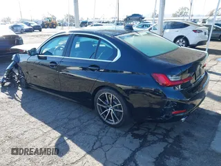 2021 BMW 3 Series 330i with VIN 3MW5R1J00M8B85692, listed as a IAAI auction lot 41824283 with 21,040 mi miles. Bid and sale history available at carsss.com. Image 3.