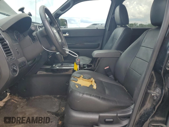 2010 Ford Escape Limited with VIN 1FMCU0E73AKD37125, listed as a Copart auction lot 59763495 with 203,823 mi miles and Salvage title. Bid and sale history available at DreamBid. Image 7.