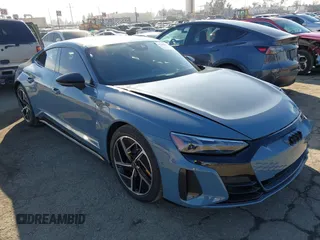 2024 Audi RS e-tron GT z VIN WAUBHBFWXR7901127, wystawiony jako IAAI lot #41220023 z przebiegiem 3414 mil mil oraz . Historia ofert i sprzedaży dostępna na DreamBid. Obrazek 1.