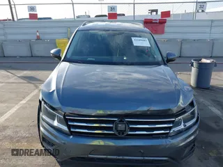 2021 Volkswagen Tiguan SE with VIN 3VV3B7AX8MM071303, listed as a IAAI auction lot 41109686 with 40,684 mi miles and . Bid and sale history available at DreamBid. Image 12.