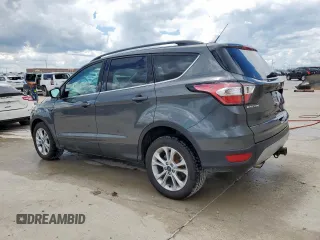 2017 Ford Escape SE z VIN 1FMCU9G91HUE17654, wystawiony jako Copart lot #56173175 z przebiegiem 97 678 mil mil oraz Czysty tytuł • Clean title. Historia ofert i sprzedaży dostępna na DreamBid. Obrazek 2.