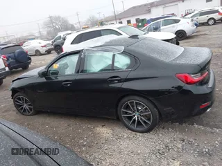 2020 BMW 3 Series 330i xDrive with VIN WBA5R7C08LFH44012, listed as a IAAI auction lot 41252675 with 57,486 mi miles. Bid and sale history available at carsss.com. Image 13.