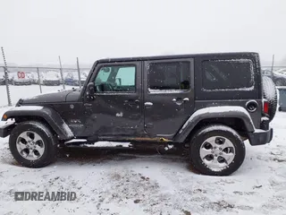 2017 Jeep Wrangler Unlimited Sahara with VIN 1C4BJWEG4HL591149, listed as a IAAI auction lot 41542157 with 70,630 mi miles. Bid and sale history available at carsss.com. Image 14.