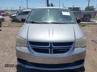 2013 Dodge Grand Caravan SE with VIN 2C4RDGBG0DR702913, listed as a IAAI auction lot 42007786 with 163,981 mi miles and . Bid and sale history available at DreamBid. Image 6.