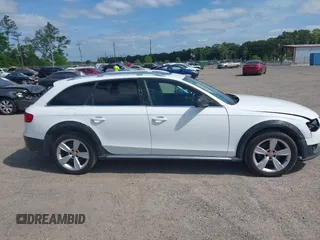 2015 Audi allroad Premium Plus with VIN WA1UFAFLXFA055527, listed as a IAAI auction lot 41760426 with 130,238 mi miles. Bid and sale history available at carsss.com. Image 13.