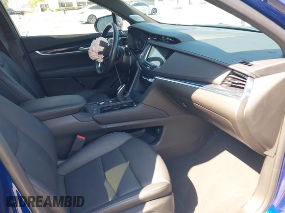 2023 Cadillac XT5 FWD Premium Luxury z VIN 1GYKNCRS3PZ176654, wystawiony jako IAAI lot #42136259 z przebiegiem 20 403 mil mil oraz . Historia ofert i sprzedaży dostępna na DreamBid. Obrazek 5.