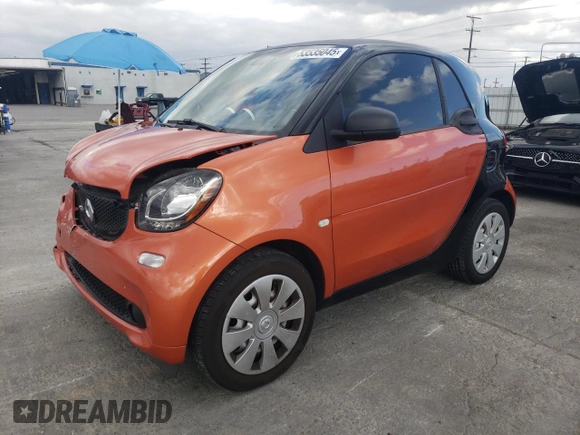 2016 Smart fortwo Passion z VIN WMEFJ5DAXGK069026, wystawiony jako Copart lot #53535045 z przebiegiem 34 410 mil mil oraz Tytuł czysty. Historia ofert i sprzedaży dostępna na DreamBid. Obrazek 1.