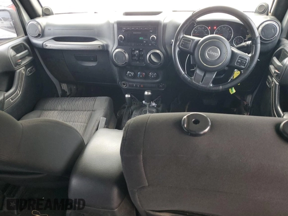 2012 Jeep Wrangler Unlimited Sport RHD with VIN 1C4BJWKG3CL220996, listed as a Copart auction lot 87860055 with 175,725 mi miles and Clean title. Bid and sale history available at DreamBid. Image 8.