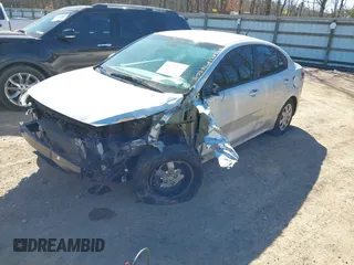 2022 Kia Rio S with VIN 3KPA24AD2NE447421, listed as a IAAI auction lot 41682873 with 52,963 mi miles. Bid and sale history available at carsss.com. Image 2.