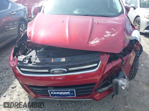 2016 Ford Escape Titanium with VIN 1FMCU0J93GUB11073, listed as a IAAI auction lot 41751349 with 92,000 mi miles. Bid and sale history available at carsss.com. Image 6.