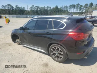 2021 BMW X1 xDrive28i z VIN WBXJG9C07M5S73464, wystawiony jako Copart lot #50374525 z przebiegiem 117 828 mil mil oraz Tytuł czysty. Historia ofert i sprzedaży dostępna na DreamBid. Obrazek 2.