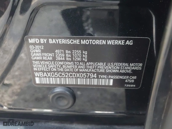 2012 BMW 5 Series 528i with VIN WBAXG5C52CDX05794, listed as a IAAI auction lot 41796084 with 104,022 mi miles. Bid and sale history available at carsss.com. Image 9.