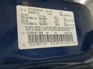 2006 Dodge Durango SLT z VIN 1D4HB48N06F133662, wystawiony jako Copart lot #51916235 z przebiegiem Nie podano mil oraz Szkoda całkowita • Salvage title. Historia ofert i sprzedaży dostępna na DreamBid. Obrazek 13.