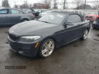 2015 BMW 2 Series 228i xDrive with VIN WBA1K7C55FV473349, listed as a Copart auction lot 49369525 with 174,716 mi miles and Salvage Title. Bid and sale history available at DreamBid. Image 1.