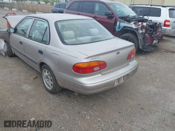 1999 Chevrolet Prizm z VIN 1Y1SK5280XZ445777, wystawiony jako IAAI lot #42138329 z przebiegiem 228 719 mil mil oraz . Historia ofert i sprzedaży dostępna na DreamBid. Obrazek 3.