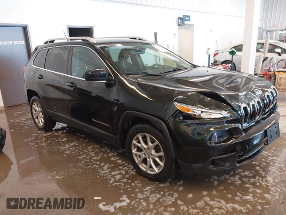 2015 Jeep Cherokee Latitude with VIN 1C4PJLCB9FW536767, listed as a IAAI auction lot 41380122 with 192,535 mi miles. Bid and sale history available at carsss.com. Image 1.