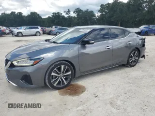 2020 Nissan Maxima SV with VIN 1N4AA6CV2LC364053, listed as a Copart auction lot 61956855 with 110,396 mi miles and Salvage title. Bid and sale history available at DreamBid. Image 1.