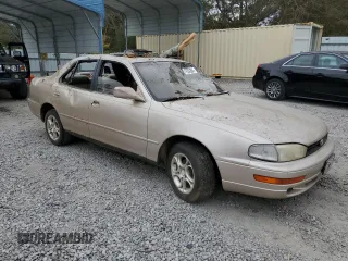 1993 Toyota Camry LE with VIN 4T1SK12E5PU316445, listed as a Copart auction lot 77534394 with 175,506 mi miles and Salvage Title. Bid and sale history available at carsss.com. Image 4.