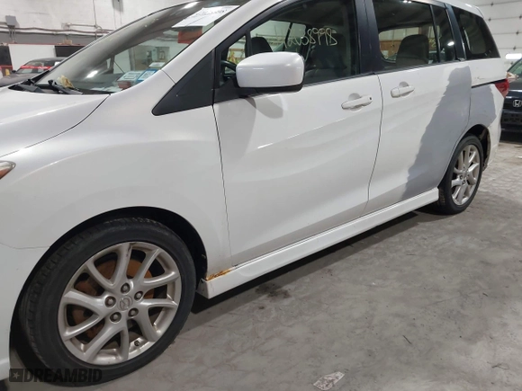 2012 Mazda Mazda5 Grand Touring with VIN JM1CW2DL9C0100114, listed as a IAAI auction lot 42038998 with 160,651 mi miles. Bid and sale history available at carsss.com. Image 12.
