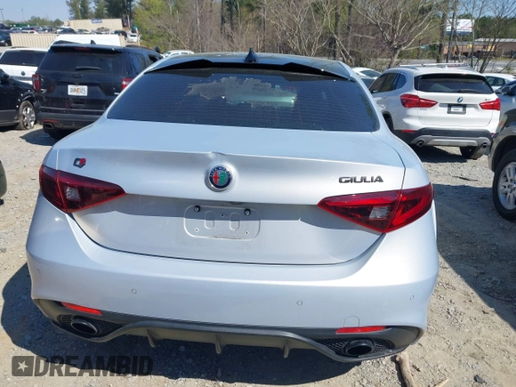 2021 Alfa Romeo Giulia Ti Sport with VIN ZARFAMBN1M7641345, listed as a IAAI auction lot 41856804 with 55,138 mi miles and . Bid and sale history available at DreamBid. Image 16.