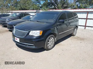 2013 Chrysler Town & Country Touring with VIN 2C4RC1BGXER216837, listed as a IAAI auction lot 41813424 with 216,395 mi miles and . Bid and sale history available at DreamBid. Image 2.