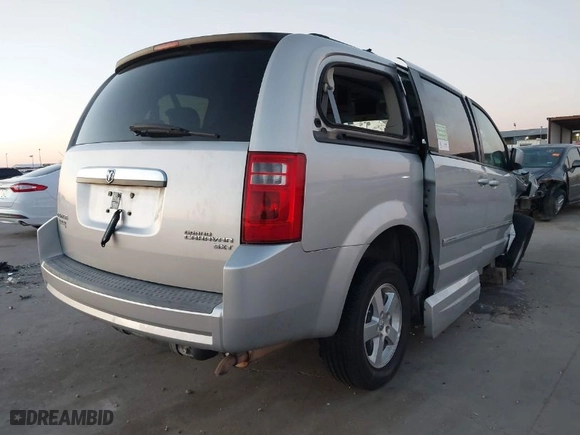 2009 Dodge Grand Caravan SXT with VIN 2D8HN54109R564465, listed as a IAAI auction lot 41372345 with 44,173 mi miles. Bid and sale history available at carsss.com. Image 4.