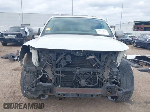 2015 Nissan Armada SV z VIN 5N1BA0ND5FN600845, wystawiony jako IAAI lot #41531206 z przebiegiem 185 476 mil mil oraz . Historia ofert i sprzedaży dostępna na DreamBid. Obrazek 13.