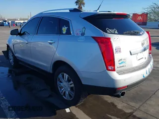 2013 Cadillac SRX Luxury Collection with VIN 3GYFNGE36DS591211, listed as a IAAI auction lot 41319932 with 174,059 mi miles. Bid and sale history available at carsss.com. Image 3.