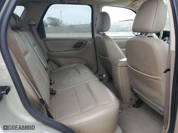 2005 Ford Escape Limited with VIN 1FMYU04195KB37679, listed as a Copart auction lot 50656585 with 218,891 mi miles and Salvage Title. Bid and sale history available at carsss.com. Image 11.