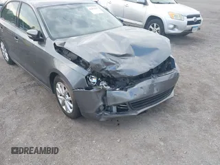 2011 Volkswagen Jetta SE with VIN 3VWDX7AJ5BM388532, listed as a IAAI auction lot 42453112 with 120,170 mi miles and . Bid and sale history available at DreamBid. Image 6.