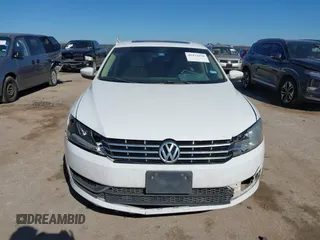 2014 Volkswagen Passat TDI SE w/Sunroof with VIN 1VWBN7A32EC016554, listed as a IAAI auction lot 41472156 with 178,149 mi miles. Bid and sale history available at carsss.com. Image 12.