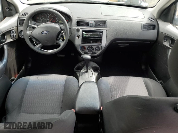 2006 Ford Focus S z VIN 1FAFP37N76W182882, wystawiony jako Copart lot #56939295 z przebiegiem 136 831 mil mil oraz Szkoda całkowita • Salvage title. Historia ofert i sprzedaży dostępna na DreamBid. Obrazek 8.