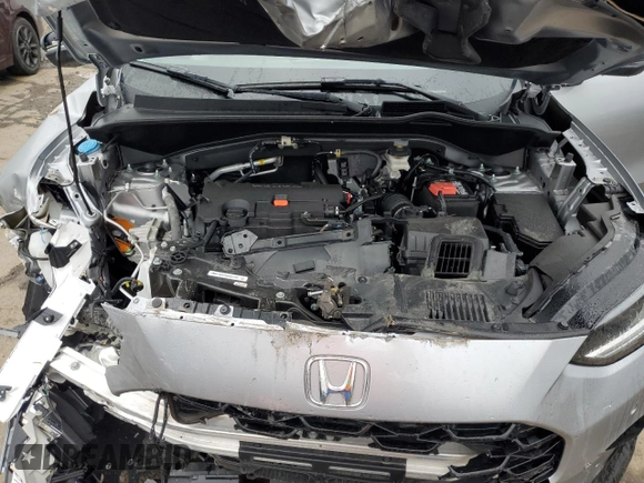 2024 Honda HR-V EX-L z VIN 3CZRZ2H79RM711744, wystawiony jako Copart lot #55911985 z przebiegiem 8 261 mil mil oraz Szkoda całkowita • Salvage title. Historia ofert i sprzedaży dostępna na DreamBid. Obrazek 12.