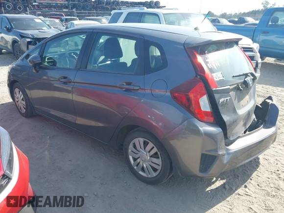 2015 Honda Fit LX with VIN 3HGGK5H52FM771511, listed as a IAAI auction lot 42132749 with 96,666 mi miles and . Bid and sale history available at DreamBid. Image 3.
