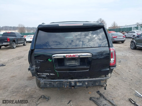 2016 GMC Yukon XL Denali with VIN 1GKS2HKJ8GR139858, listed as a IAAI auction lot 41915183 with 151,830 mi miles. Bid and sale history available at carsss.com. Image 17.
