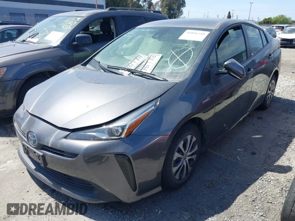 2022 Toyota Prius L Eco with VIN JTDKAMFU7N3154041, listed as a IAAI auction lot 41896210 with 46,382 mi miles and . Bid and sale history available at DreamBid. Image 2.