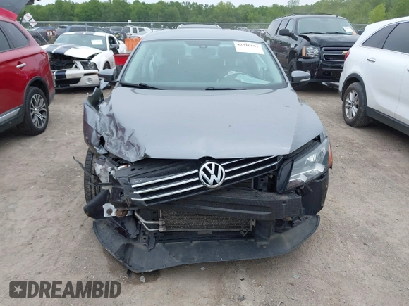 2014 Volkswagen Passat Wolfsburg Edition with VIN 1VWAT7A37EC102282, listed as a IAAI auction lot 42310561 with 113,374 mi miles and . Bid and sale history available at DreamBid. Image 13.
