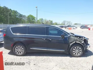 2017 Chrysler Pacifica Touring L with VIN 2C4RC1BG7HR539716, listed as a IAAI auction lot 42037822 with 160,623 mi miles and . Bid and sale history available at DreamBid. Image 14.