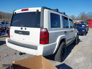 2006 Jeep Commander with VIN 1J8HG48K76C330603, listed as a IAAI auction lot 41183106 with 1 mi miles. Bid and sale history available at carsss.com. Image 4.