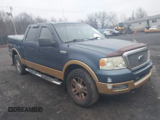 2005 Ford F-150 XLT with VIN 1FTPW14565KE80310, listed as a IAAI auction lot 41874484 with 173,315 mi miles. Bid and sale history available at carsss.com. Image 1.