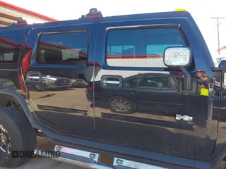 2004 Hummer H2 with VIN 5GRGN23U64H101592, listed as a IAAI auction lot 41379405 with 174,672 mi miles. Bid and sale history available at carsss.com. Image 13.